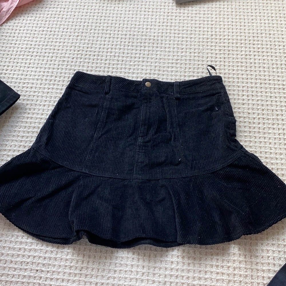Never worn! Black corduroy mini skirt